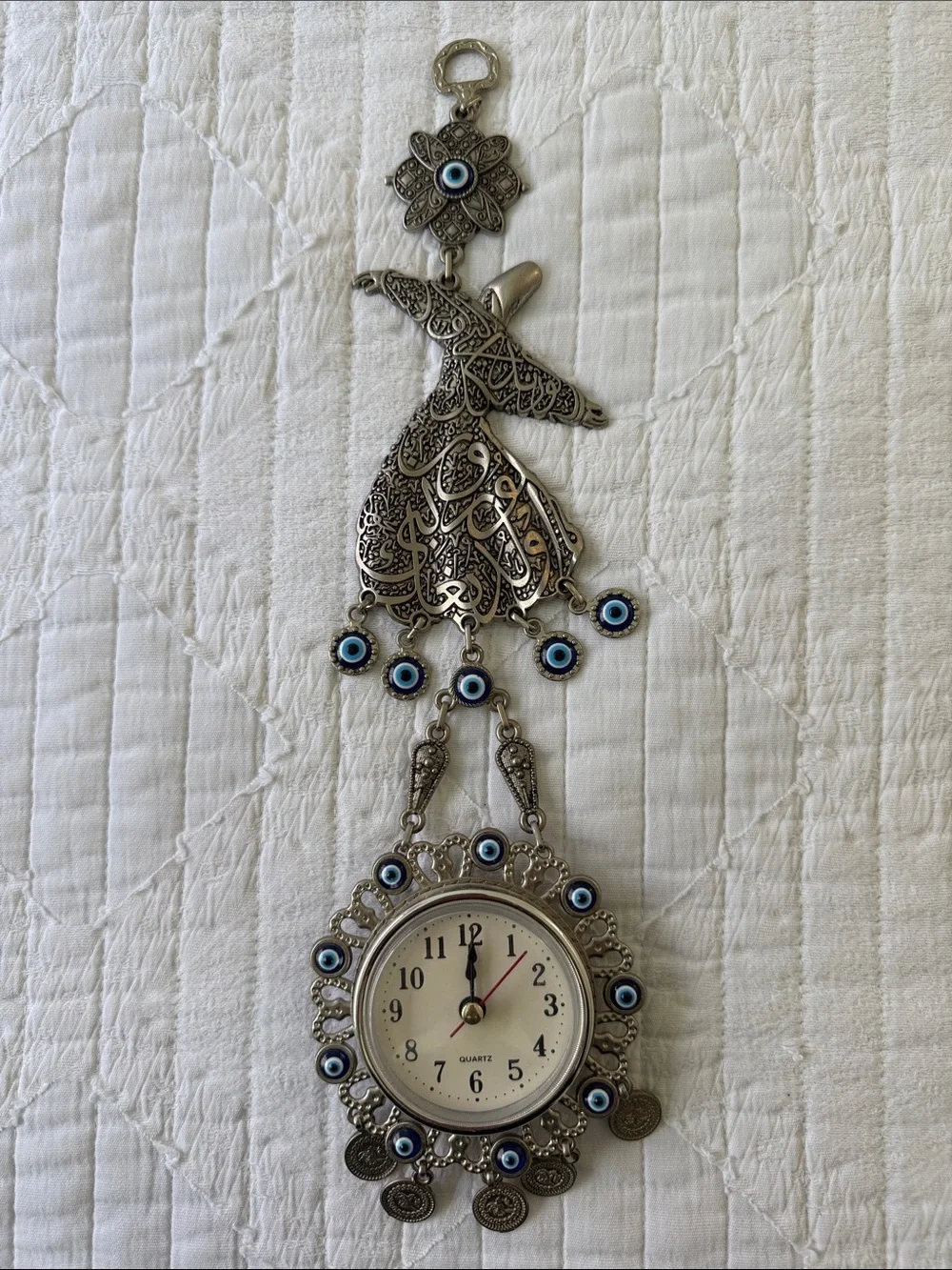Silver Whirling Dervish Wall Clock with Blue Eye Accents from Turkey